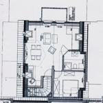 Grundriss einer Wohnung mit Küche, Essbereich, Schlafzimmer und Bad.