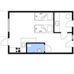 Two bedrooms, kitchen, bathroom, and toilet. Floor plan with compass.