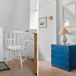 House with white walls, wooden floor, and blue dresser with lamp.
