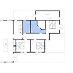 Funktionaler Grundriss mit Küche, Schlafzimmer und Waschraum. Richtungskompass eingezeichnet.
