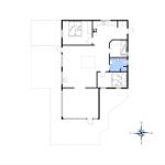 Dieses Hausplan zeigt zwei Schlafzimmer, eine Küche und ein Bad mit Dusche.