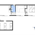 Gesamtplan zeigt Wohnbereich, Küche, Bad und Schlafzimmer mit Anhang für drei Autos.