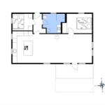 Wohnung mit Schlafzimmer, Küche und Bad. Sitzgelegenheit im Wohnbereich.