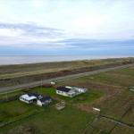 Haus mit Garten und Blick aufs Meer