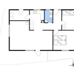 Wohnung mit Küche, Bad, Schlafzimmer und Wohnbereich mit Kompass.