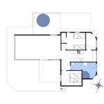 Dies ist die Grundrisszeichnung einer Ferienwohnung mit Küche, Schlafzimmer und Bad.