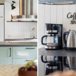 Küche mit Kühlschrank, Spüle und Kaffeemaschine. Wanddekoration mit Schriftzug.