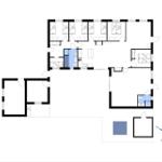 Grundriss einer Ferienwohnung mit mehreren Schlafzimmern und Küche.