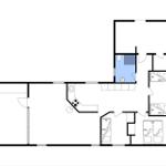 Apartment with kitchen, bathroom, and three bedrooms with beds.