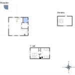 Geschossplan zeigt Wohn- und Schlafzimmer mit Bad und Anbau.