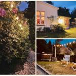House with garden, hot tub, and lounge chairs at night with string lights.