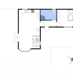 Wohnung mit Küche, Bad und Schlafzimmer mit Schlafcouch.