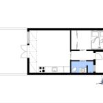 Wohnung mit Küche, Bad und Schlafzimmer mit Doppelbett.