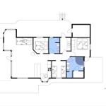 Apartment with kitchen, bedrooms, and bathroom. Hallway and staircase marked.