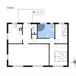 Geschossplan zeigt Küche, Bad, Schlafzimmer und Wohnbereich mit Stiegenhaus.