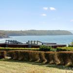 Modern villa with sea view and green hills