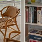 Ein braunes Ledersessel vor einem Fenster und ein Bücherregal mit verschiedenen Büchern.
