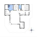 Die Wohnung hat mehrere Schlafzimmer und eine Küche mit Kochfeld.