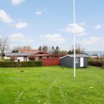 Haus mit Garten, Schuppen und Blick auf Wasser