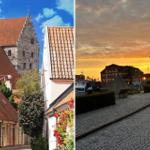 Altstadt mit Kirche und gepflasterte Straße mit Hafen bei Sonnenuntergang.