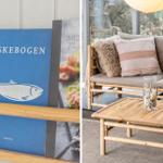 Buch mit Fischmotiv und Bambusmöbel im Wohnbereich.