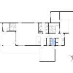 Dieses Grundriss zeigt eine Wohnung mit mehreren Schlafzimmern und einer Küche.