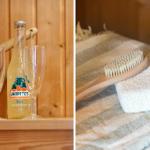 Ein Sauna mit Getränk und zwei Gläsern. Eine Bürste liegt auf einem Handtuch.