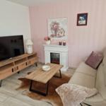 Wohnzimmer mit Elektrokamin