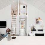 Living and dining area with loft, ladder, and TV.