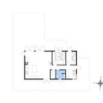 Apartment with kitchen, bedroom, and bathroom. Compass for orientation.