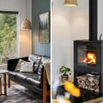 Black sofa by large window with forest view. Wood-burning stove with lit fire.