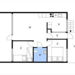 Apartment with kitchen, bathroom, bedroom, and living area. Staircase and separate rooms.