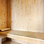 Sauna with wooden walls and bench