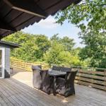 Deck with seating and view into the forest