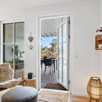 Living area with seating and view to the terrace.