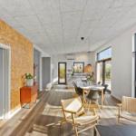 Living area with dining space, TV, and large window to terrace.