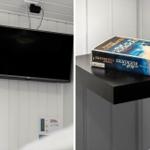 LG-TV an Wand montiert, Buch auf schwarzem Tisch