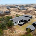 Modernes Ferienhaus mit Terrasse in Dünenlandschaft