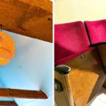 Orange Lampe hängt an Holzkonstruktion. Rote Sitzreihen mit Holzrahmen.