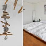 Schlafzimmer mit Bett, Wandbild und Spiegel. Hängendes Dekor aus Holz und Stein.