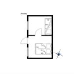 Annex with bedroom and bathroom, oriented north.