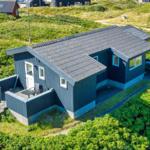 Moderne Holzhütte mit Terrasse und Garten. Ideal für Ruhe und Erholung.