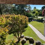 Ausblick Wohnzimmer nach Süden im Mai App. "Tjalk"