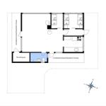 Apartment with three bedrooms, kitchen, and covered terrace.