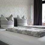 Das Schlafzimmer mit Boxspringbett für den erholsamen Schlaf