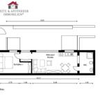 Wohnung mit Schlafzimmer, Wohnküche und WC. Maße sind angegeben.