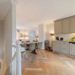 Kitchen with dining area and herringbone wood floor