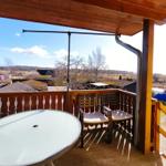 Möblierter Außenbereich im Obergeschoss zum Entspannen