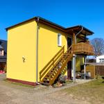 Außenansicht des Hauses mit eigenem Aufgang zur oberen Etage