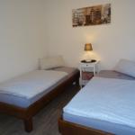 Schlafzimmer Ferienwohnung 6 mit 2 Betten
